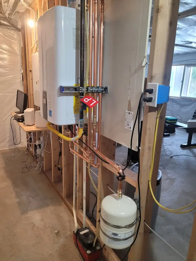 Licensed plumber repairing a kitchen sink in Baltimore