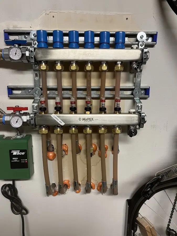 Plumber performing Water Heater Repair at a residential property in Baltimore